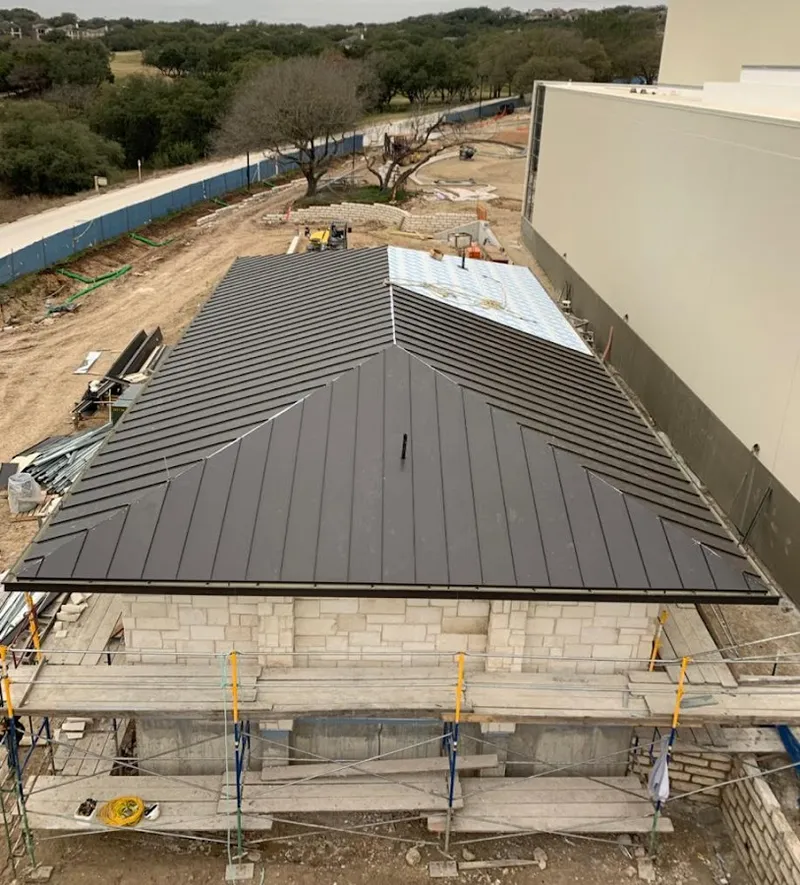 Metal roof new construction with scaffolding in Newberry